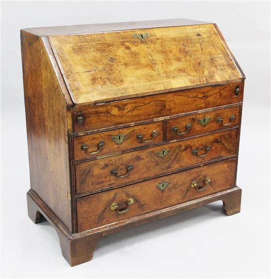 An 18th century walnut featherbanded bureau, W.3ft